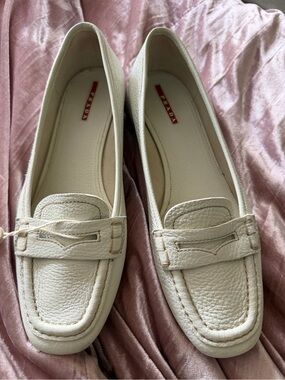 Prada Cream Pebbled Leather Loafers